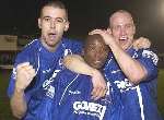 SHEER JOY: Match-winner John Keister, centre, celebrates at the end of the tie with Lee Shearer and Phil Collins. Picture: CHRIS DAVEY