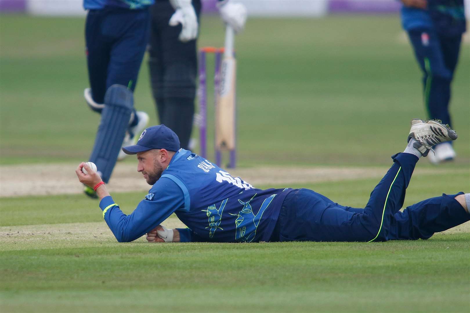 Alex Blake holding onto a catch to remove Tom Banton. Picture: Andy Jones