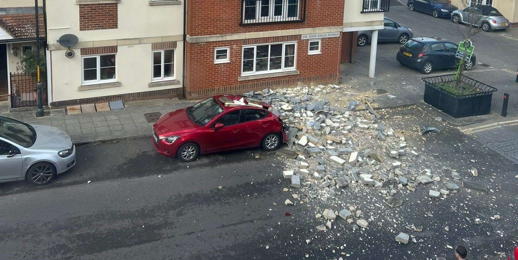 A collapse in Repton Park, Ashford, destroyed a car. Picture: Clive Bellinger