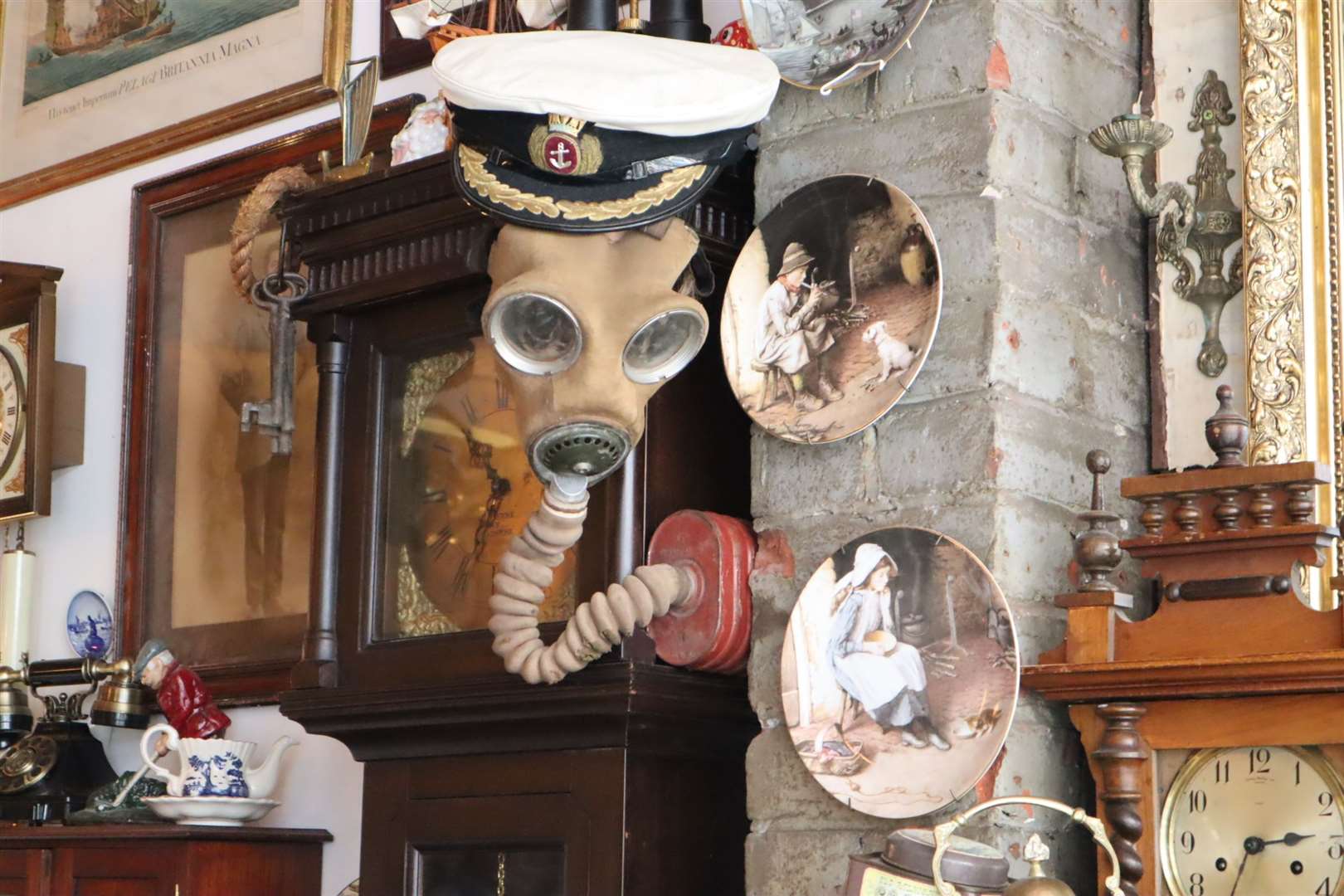 Spooky gas mask looking down at customers at the Jacksonwood tea room in Sheerness High Street