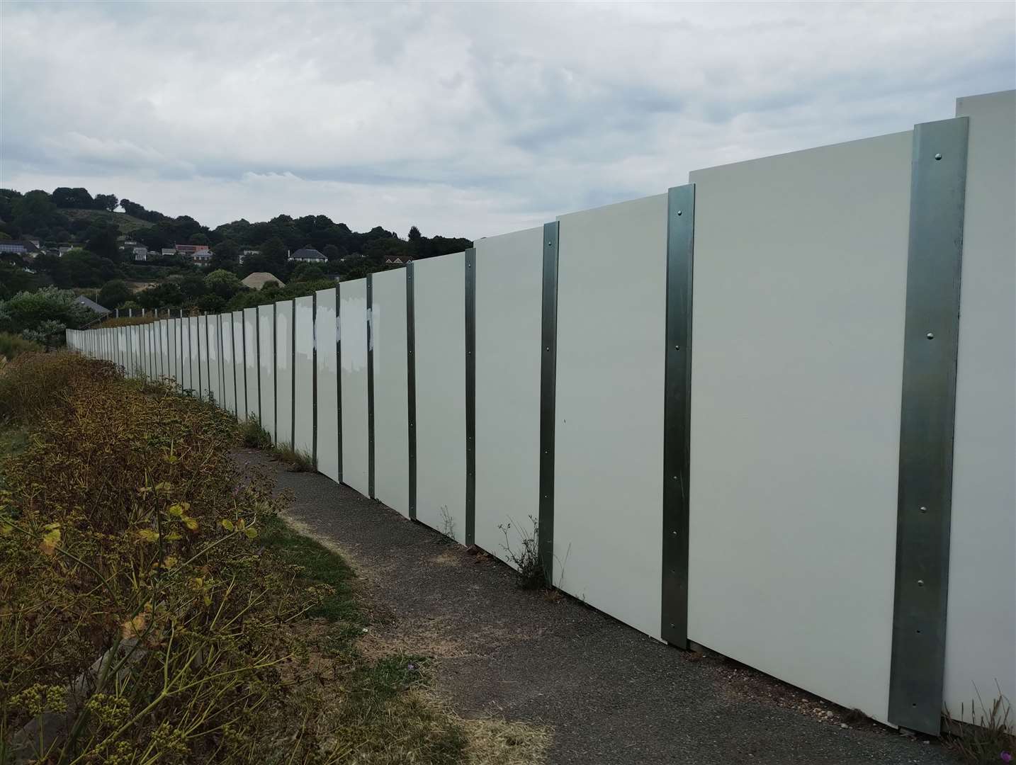 The barriers surround the now-cancelled Princes Parade development site