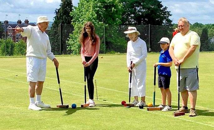 Players young and old are invited to learn the game (37606087)