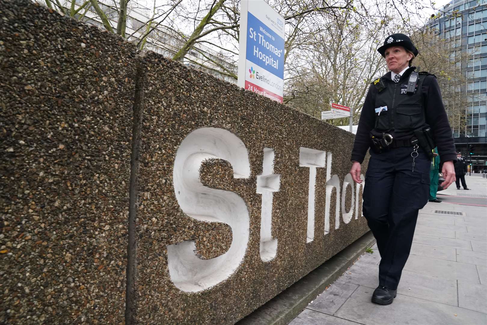 A police officer patrols outside St Thomas’ Hospital (Aaron Chown/PA)