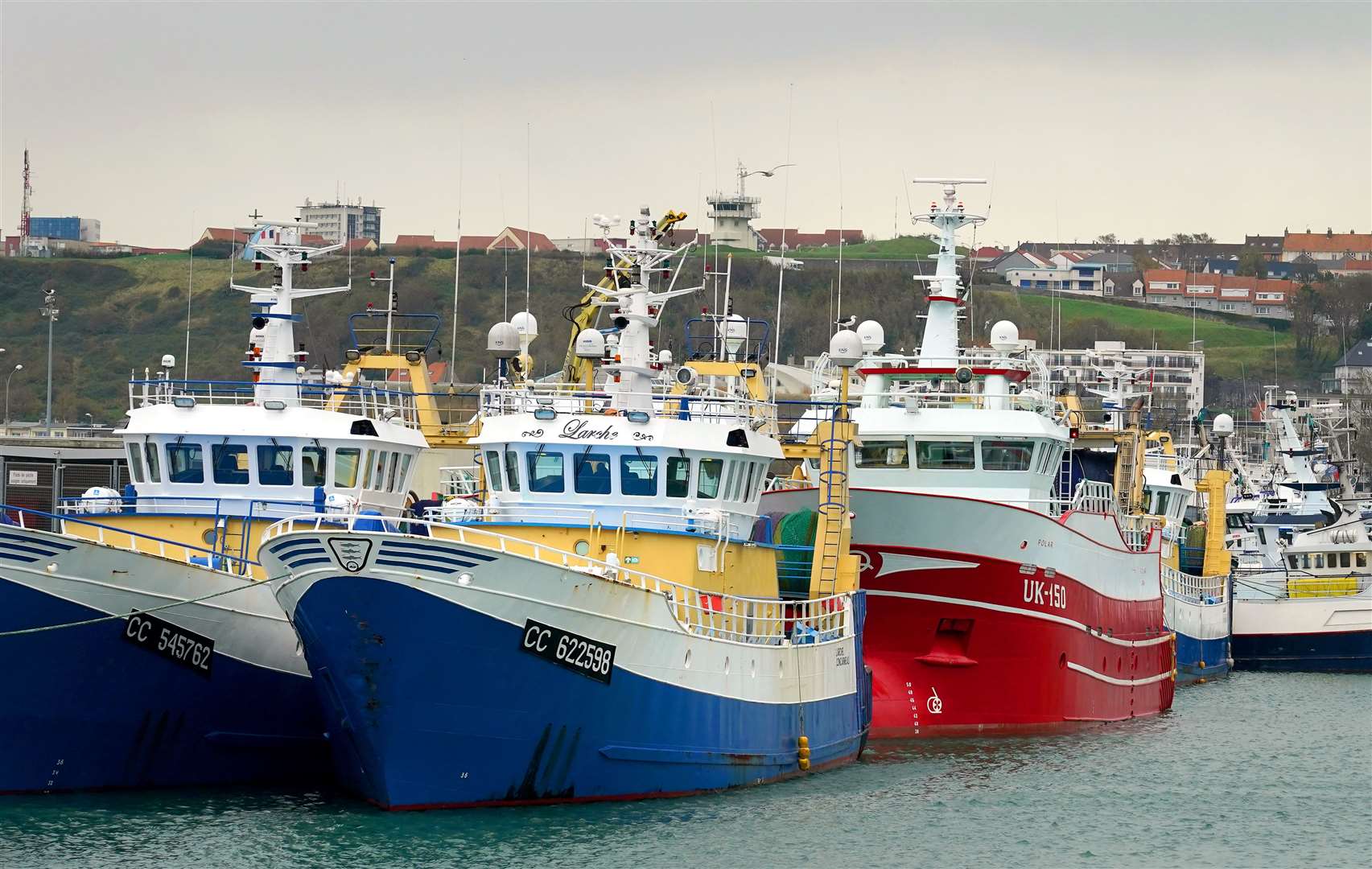 Fishing boats moored in the port of Boulogne (Gareth Fuller/PA)