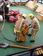 Firefighters prepare to tackle the blaze on board a ship during the Manchex exercise off the East Kent coast in 2004.