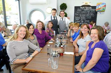 Staff and customers at Papa's Barn