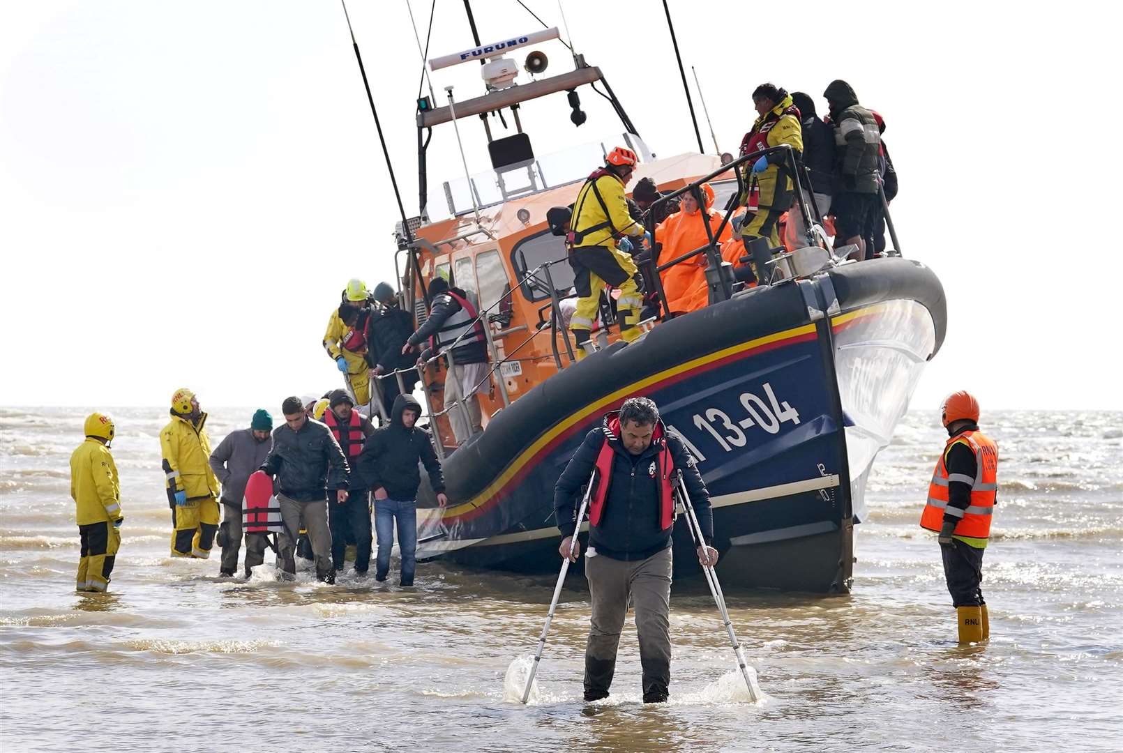 A group of people thought to be migrants are brought in to Dungeness, Kent (Gareth Fuller/PA)