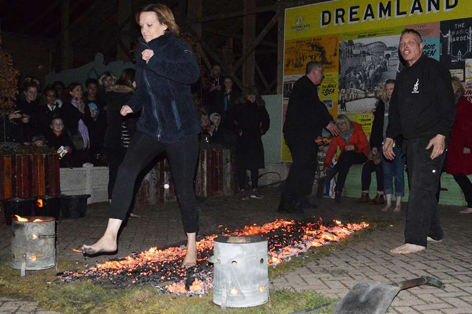 Pilgrims nurse Amanda Sherwood takes on the firewalk