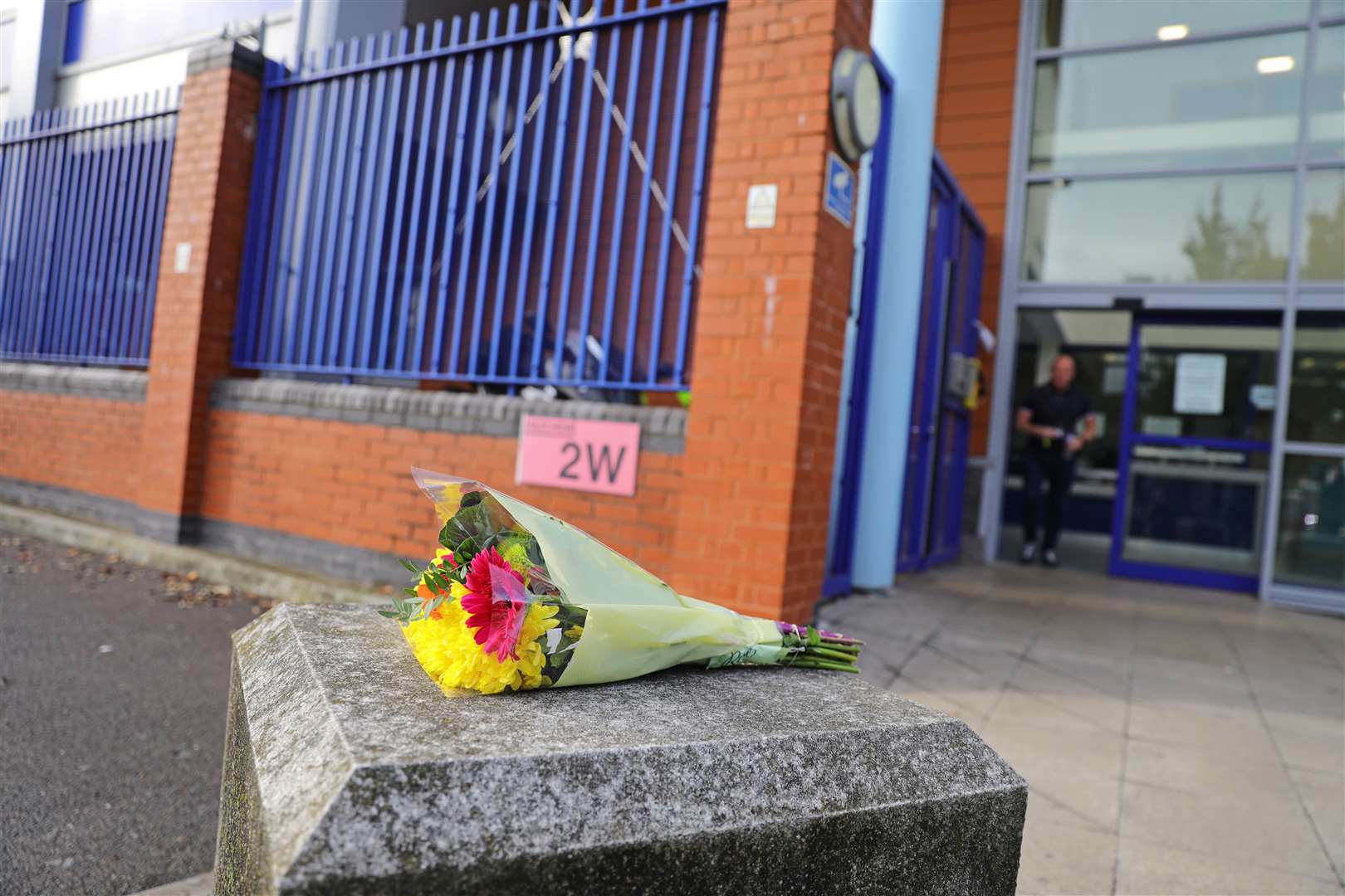 Flowers left outside Croydon Custody Centre (Aron Chown/PA)