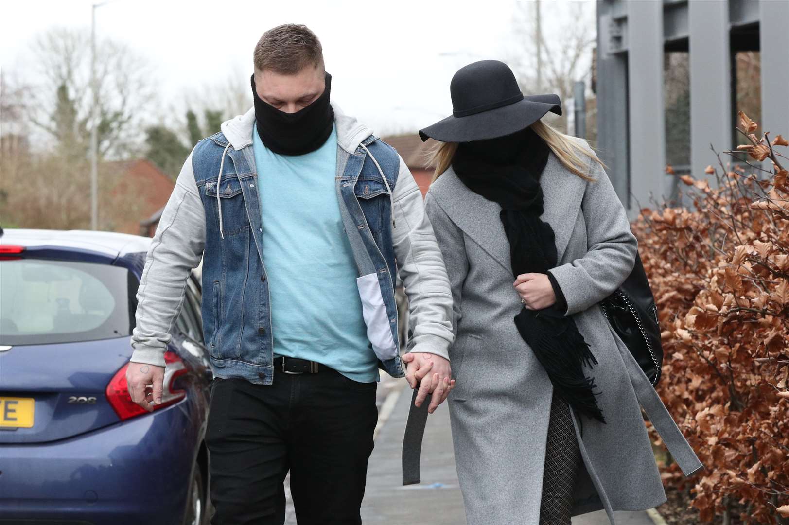 Kandice Barber leaves Amersham Law Courts with her husband, Daniel (Jonathan Brady/PA)