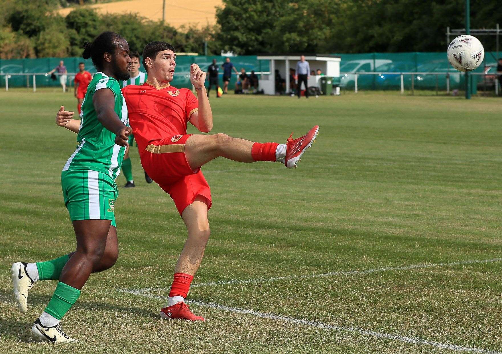 Two-goal Whitstable Town striker Harvey Smith scores with this volley during their campaign-opening 3-3 draw at Sutton Athletic at the weekend. Picture: Les Biggs