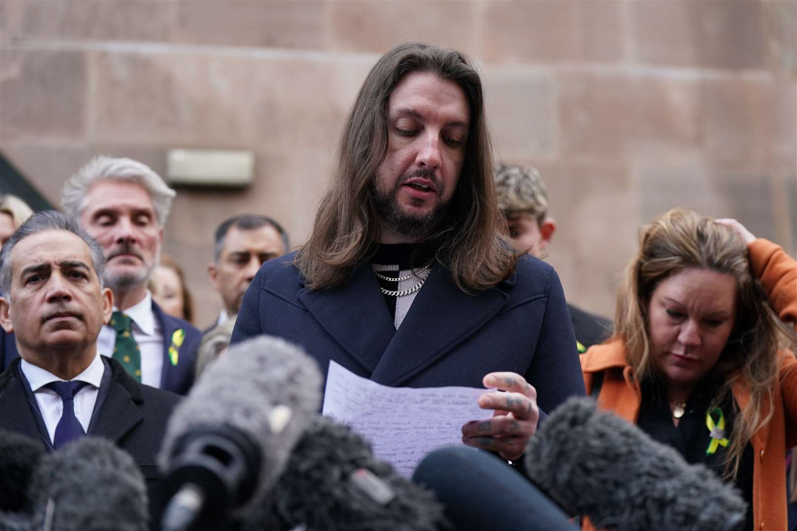 Ian Coates’ son, James, making a statement outside court (Jacob King/PA)