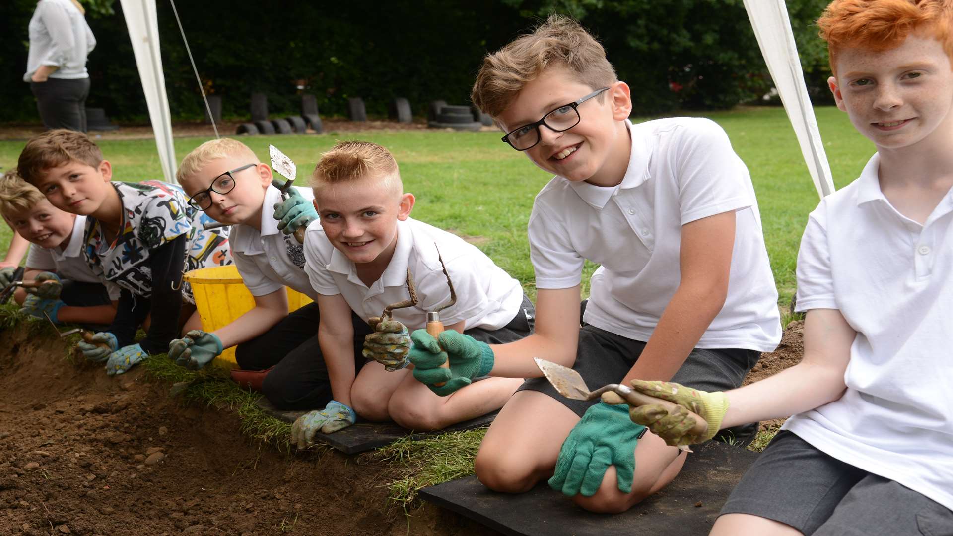 The children examine their finds. Picture: Gary Browne