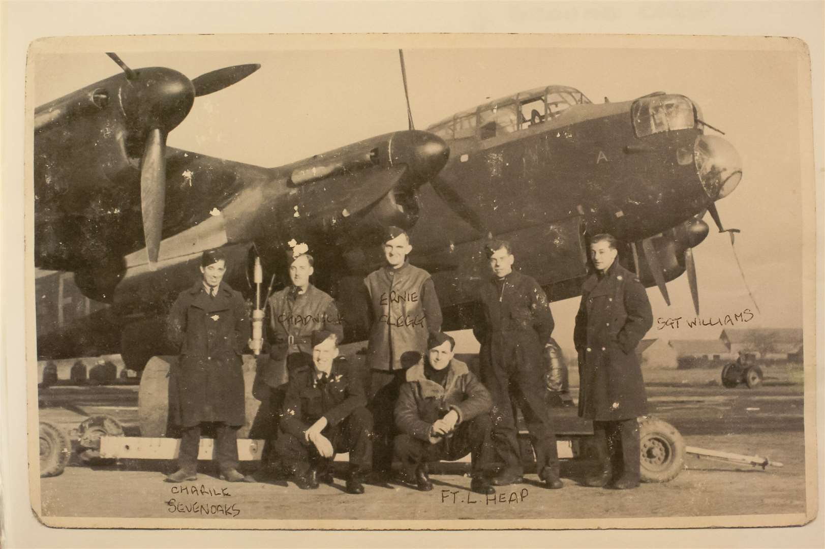 Leslie, 2nd from top right, with the crew of one of "his" Lancasters