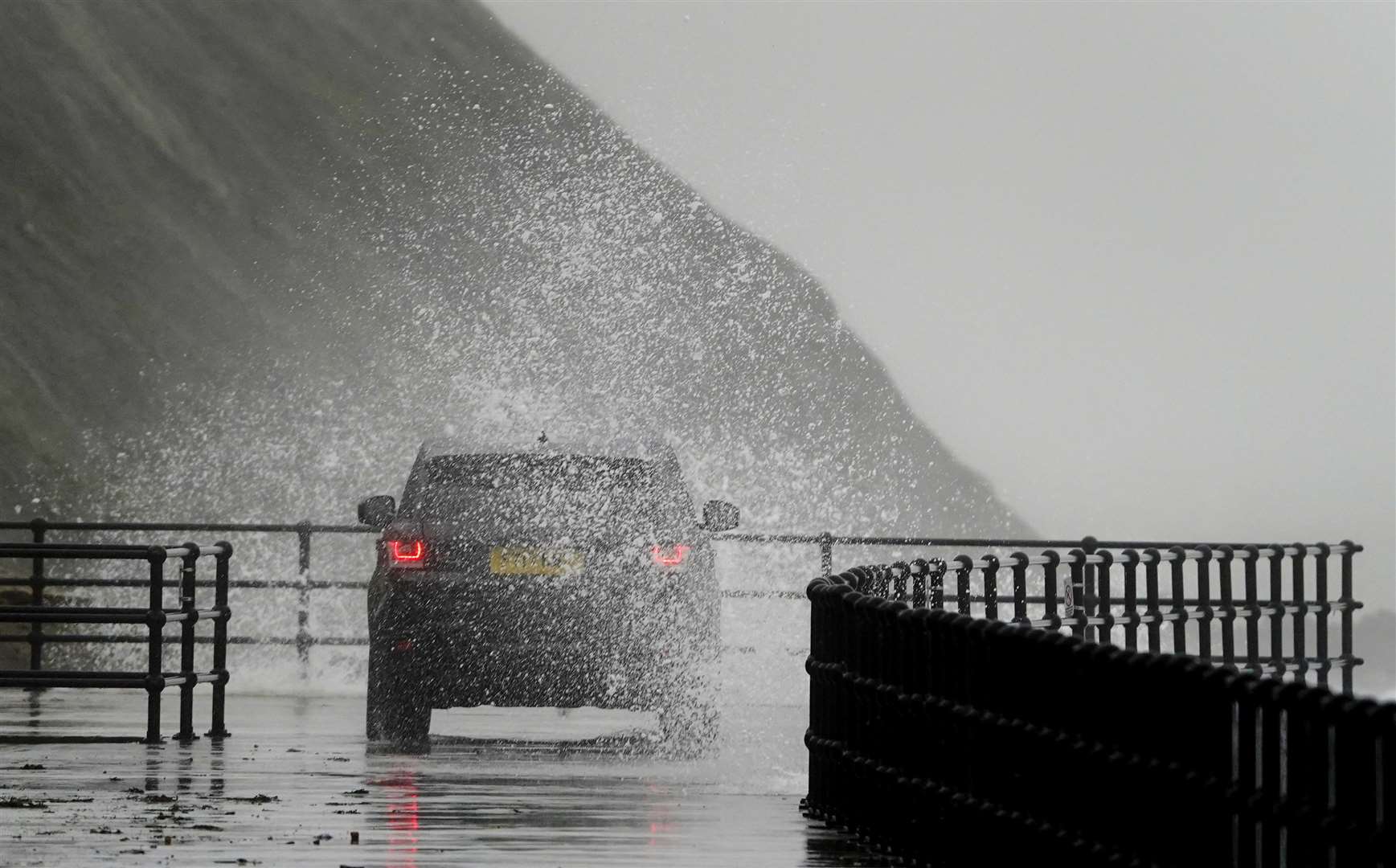 Wind warning areas can expect gusts of 50-60mph, with up to 70mph on high ground and exposed coasts (Gareth Fuller/PA)