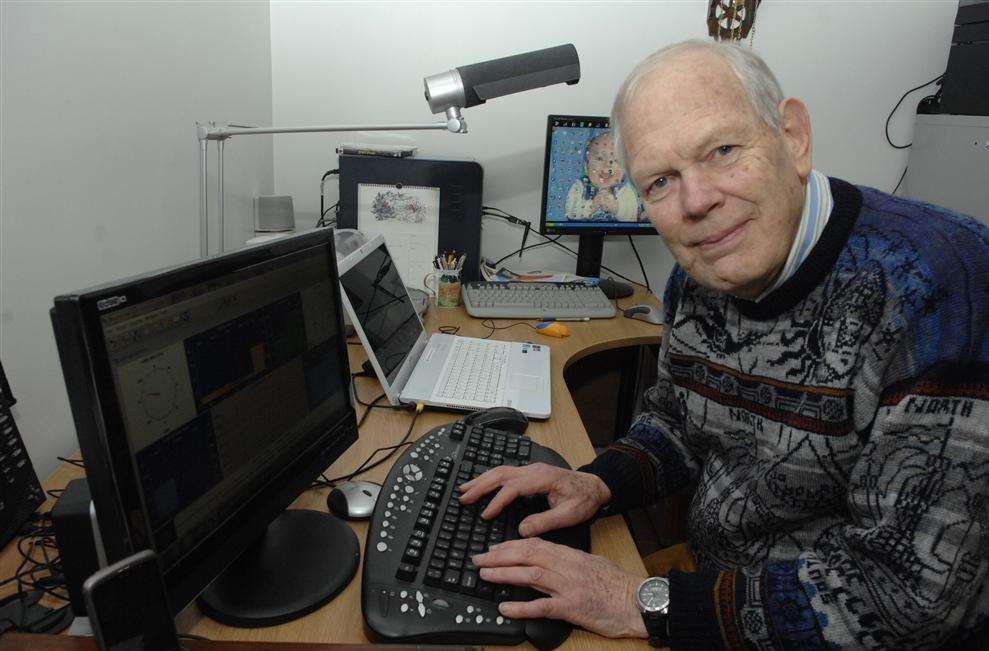 Jeremy Procter analysing the data from his weather monitoring station