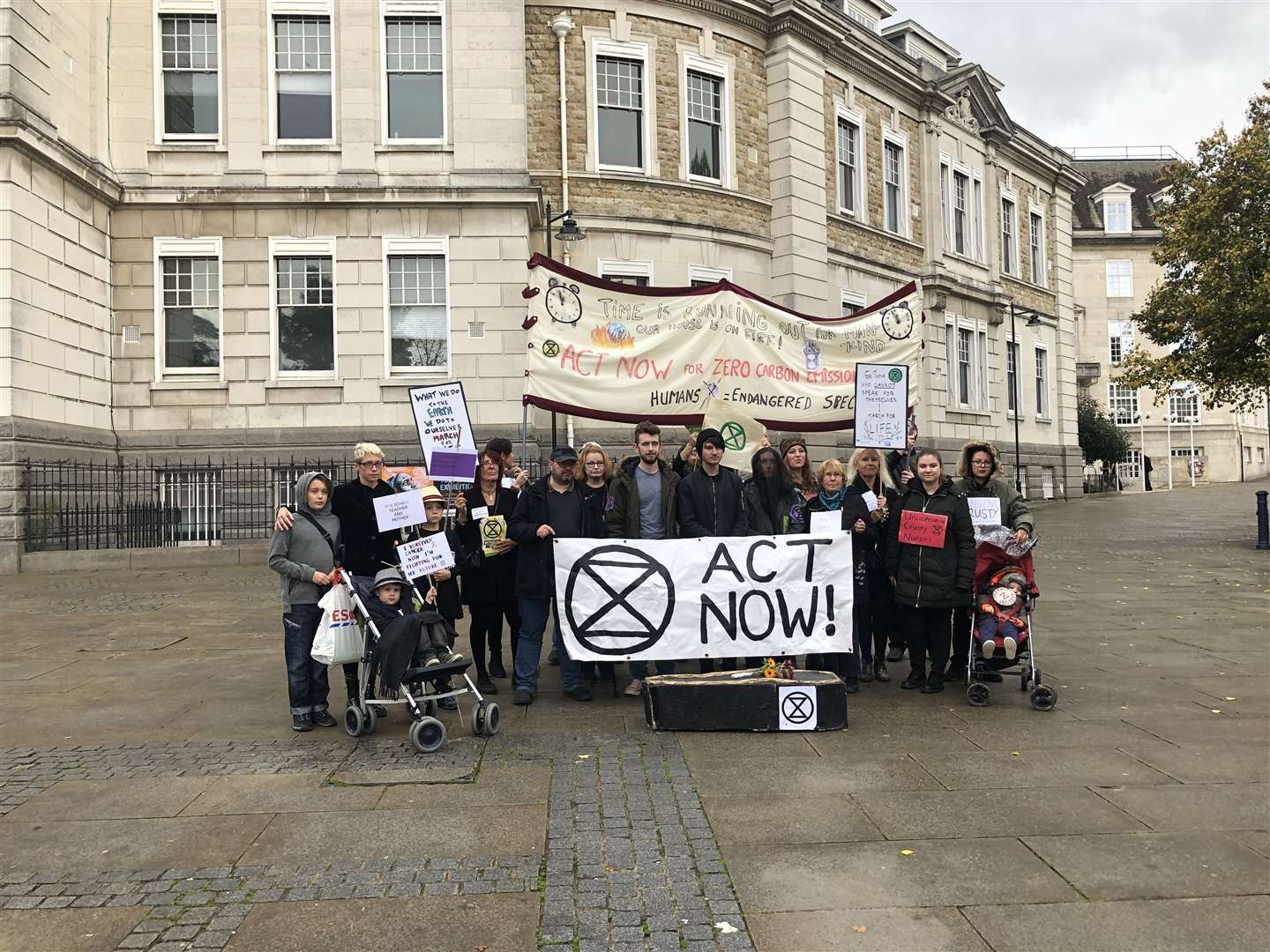 Extinction Rebellion protestors take to the streets in a funeral march