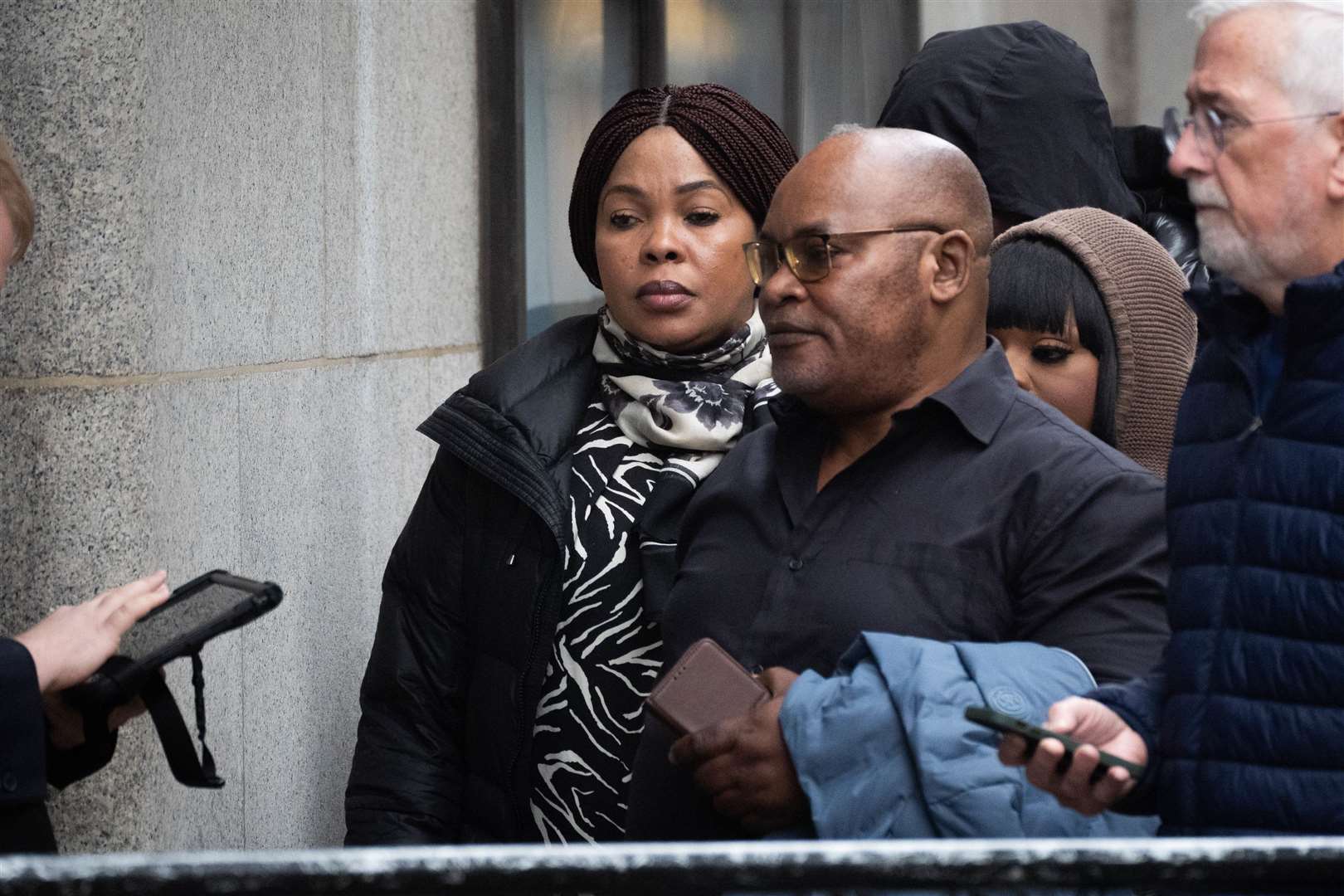 Helen Lumuanganu and Prosper Kaba, the mother and father of Chris Kaba, arriving at the Old Bailey, central London, where they observed Martyn Blake’s trial (James Manning/PA)