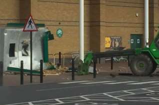 A digger was used to rip a cash machine from a supermarket. Pic Peter Ward