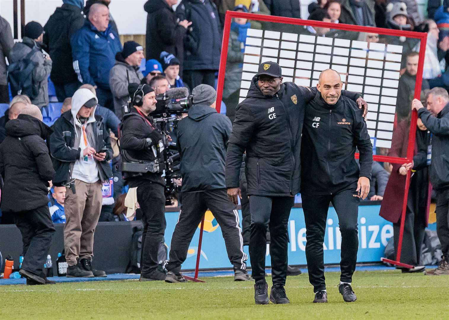 George Elokobi and Craig Fagan celebrate a job well done at Ipswich. Picture: Helen Cooper