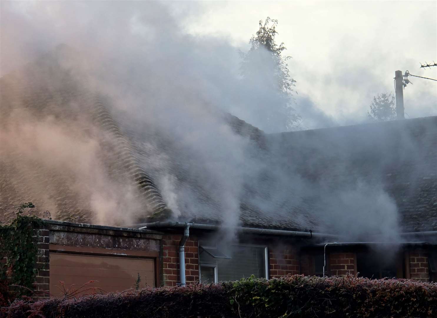 Smoke coming from a house in Station Road, Cuxton