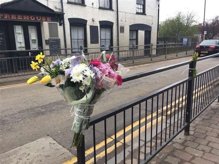 Flowers were left in Newington High Street following the death of Rod Gates