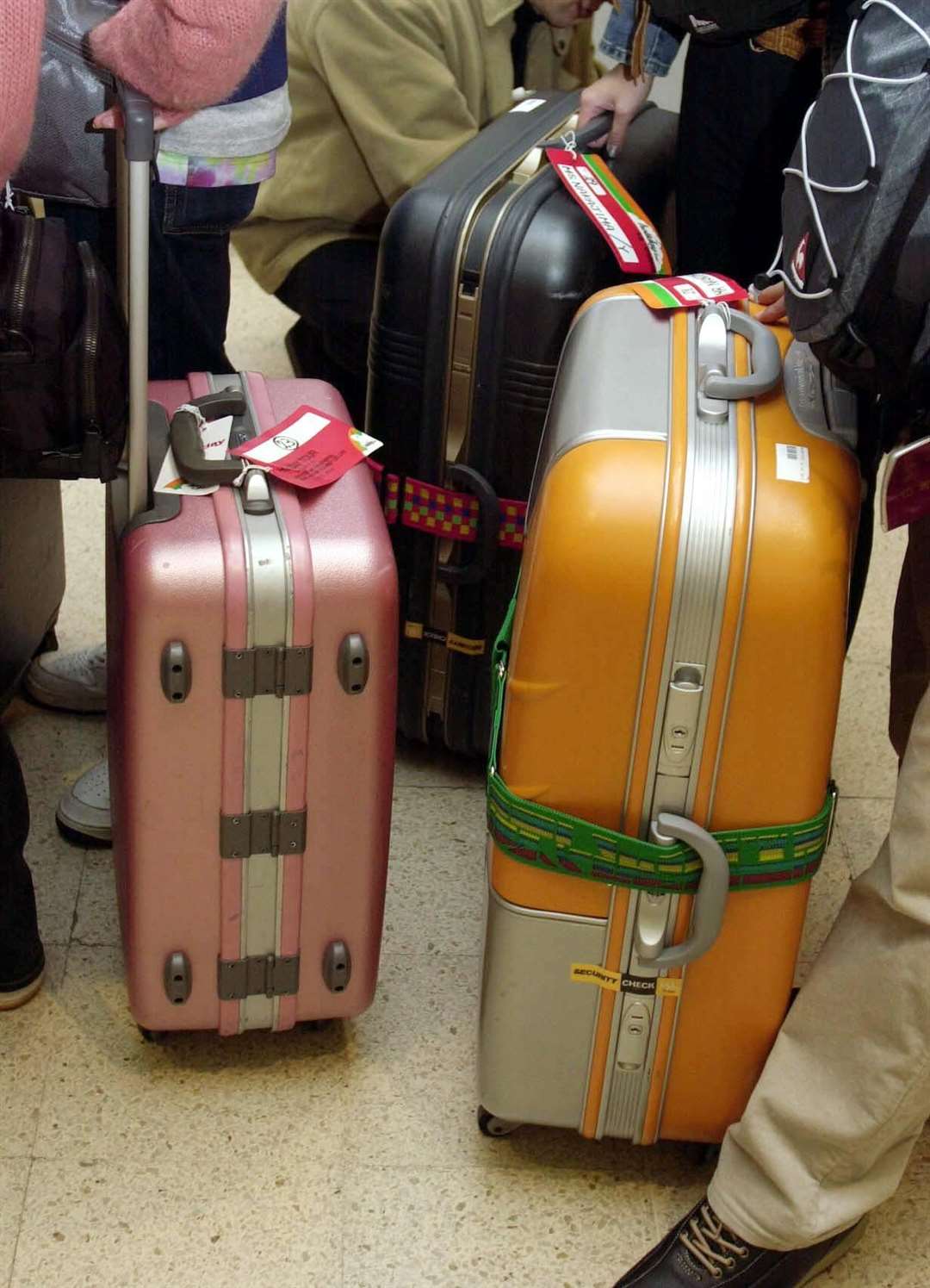 Passengers waiting with their baggage (Johnny Green/PA)