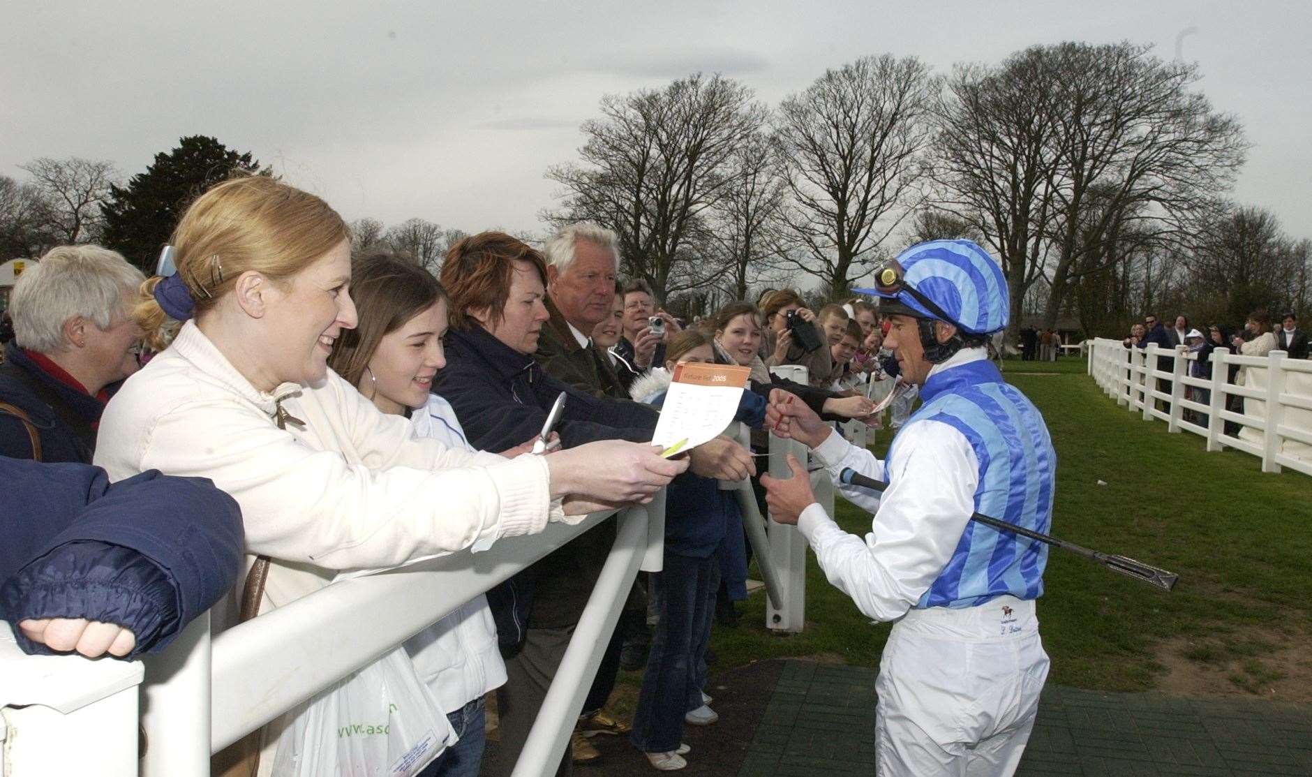 Italian star Frankie Dettori signs autographs in April 2005