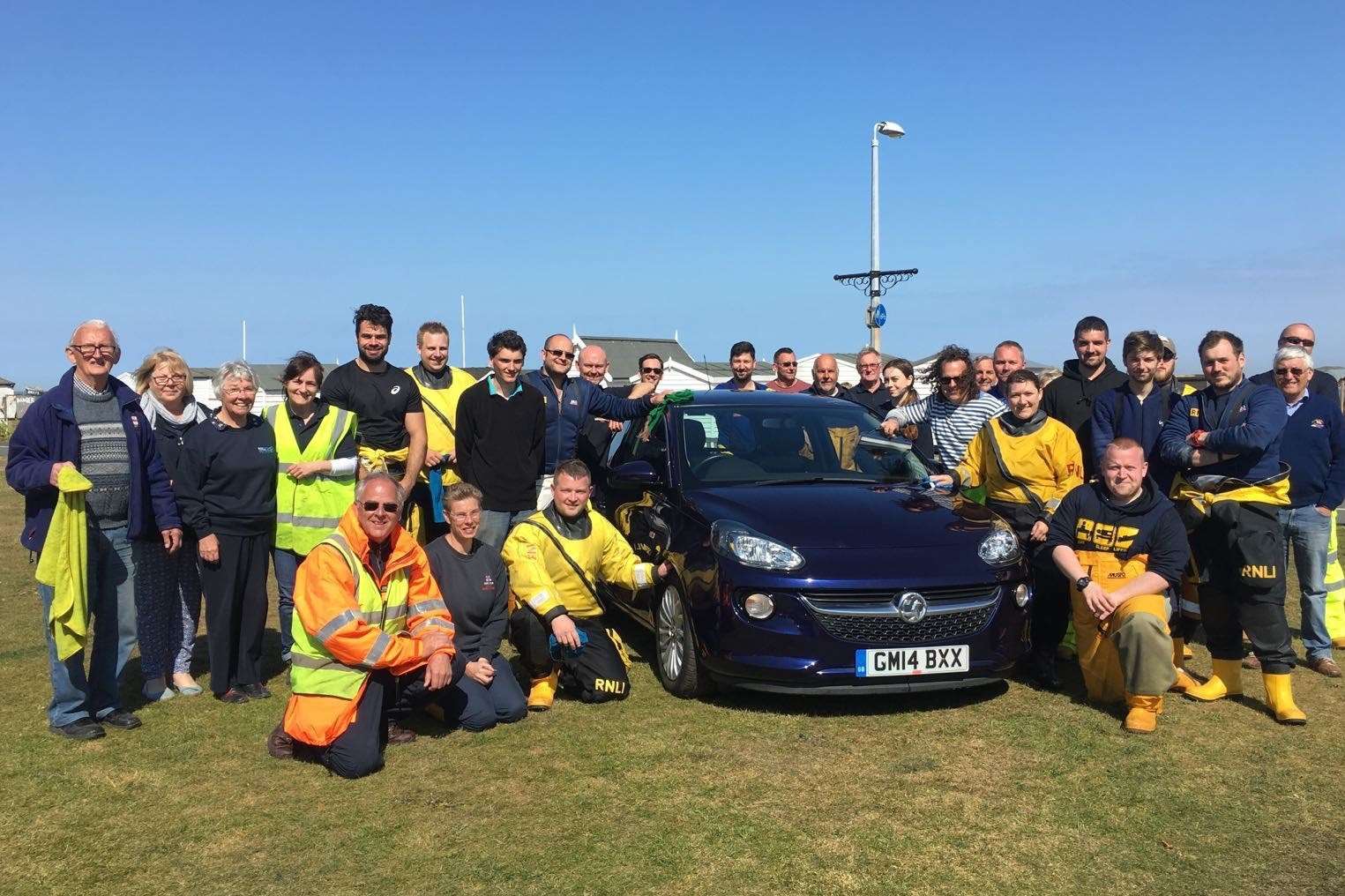 About 30 volunteers helped at the charity car wash