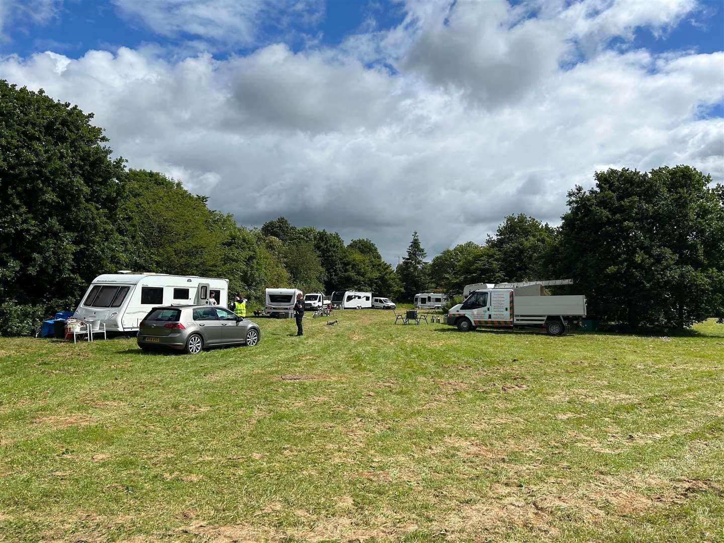 Around 10 caravans and vehicles have pitched up behind the Kinsnorth Recreation Centre in Ashford