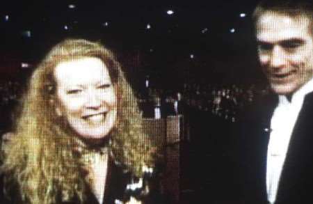 Andrea Arnold receives her award from actor Jeremy Irons. Picture courtesy GMTV Oscar Awards