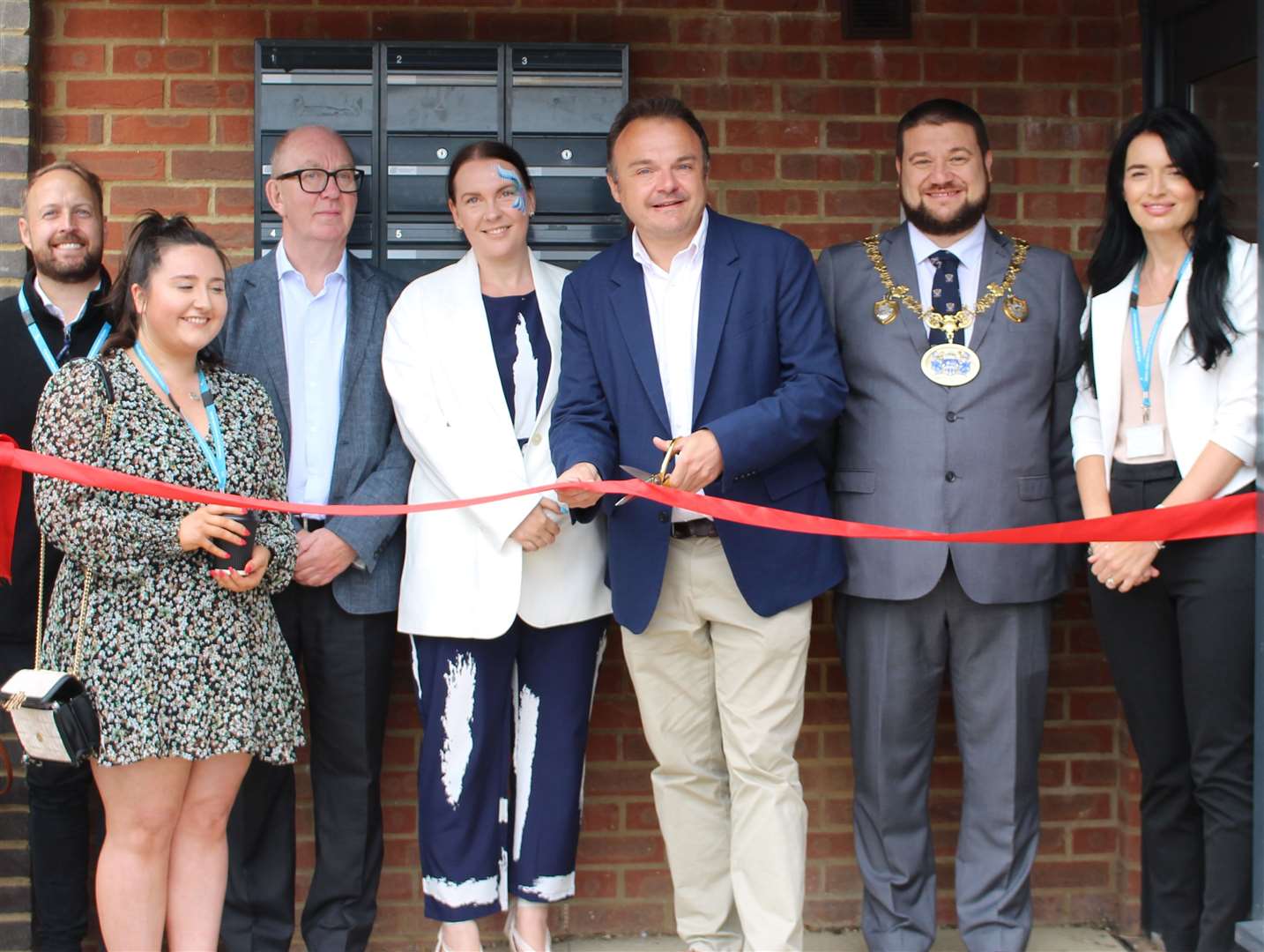 From left to right: Ashton Freeman (mhs homes), Melissa Wright (mhs homes), Nigel Hopkins (chair of mhs homes), Kara Horton (mhs homes), Tristan Osborne MP, Mayor of Medway Marian Nestorov, and Gemma Hancock, executive director of assets and development at mhs homes