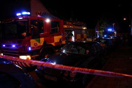 Firefighters cordon off St Bartholomew's Terrace, Rochester, where residents were evacuated after a fire broke out in the former Mak's Curry Nest in the High Street.