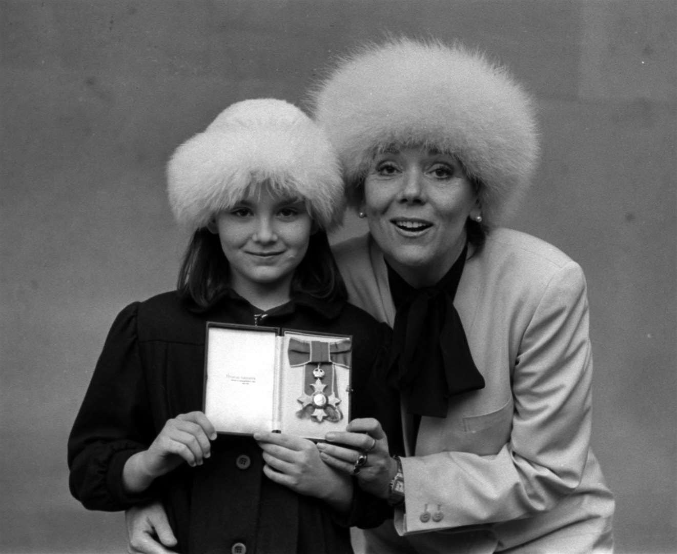 With daughter Rachael in 1988 when Dame Diana was invested as a CBE by the Queen (PA)