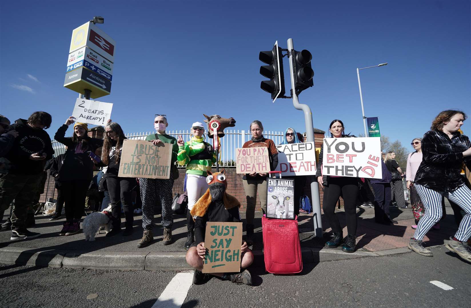 Animal Rising activists outside the gates ahead of day three of the Randox Grand National Festival at Aintree (PA)