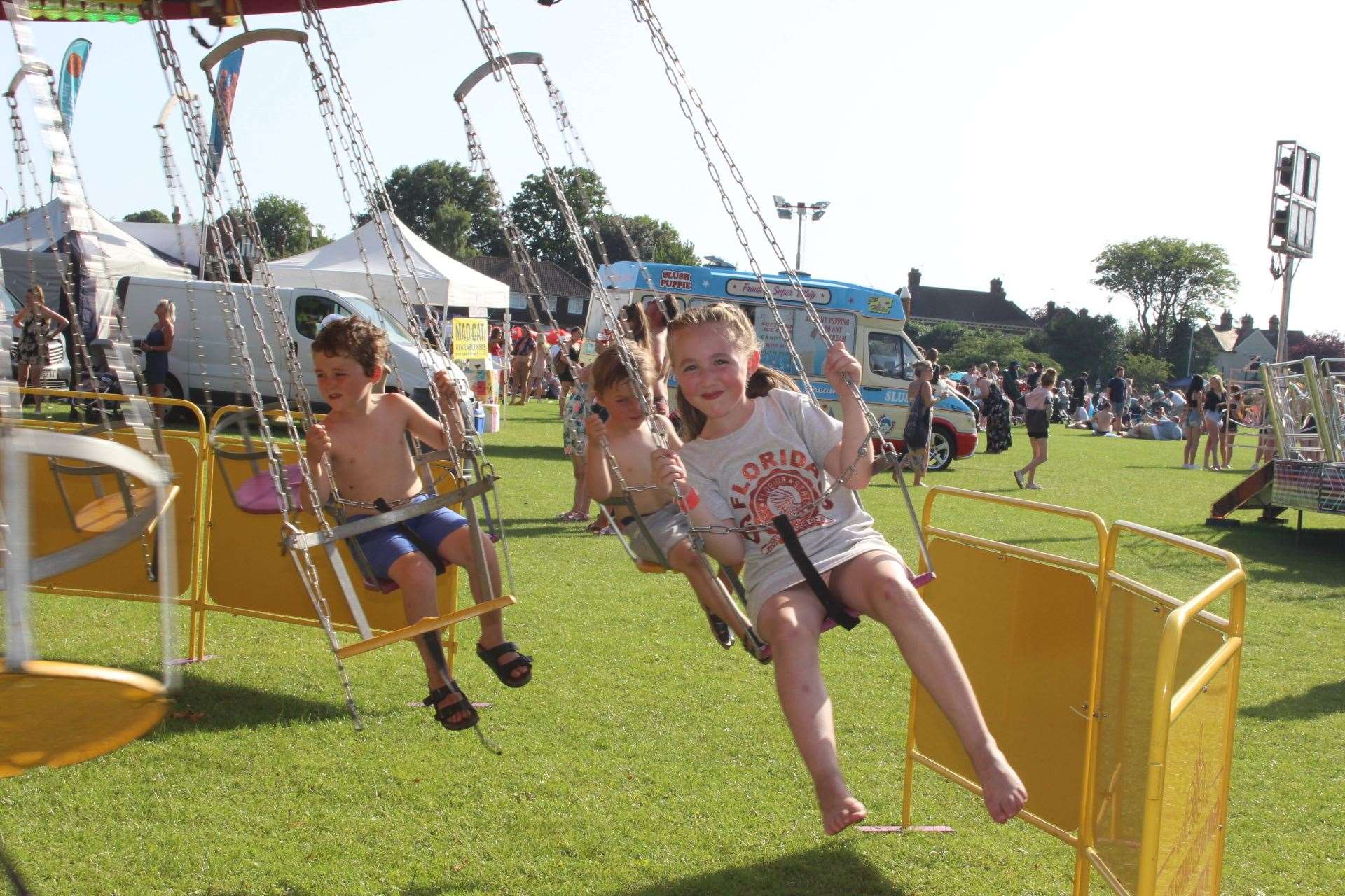 All the fun of the fair: Lola Hook, six, takes a ride on the chair-o-planes at Sittingbourne's Party in the Park (13187521)