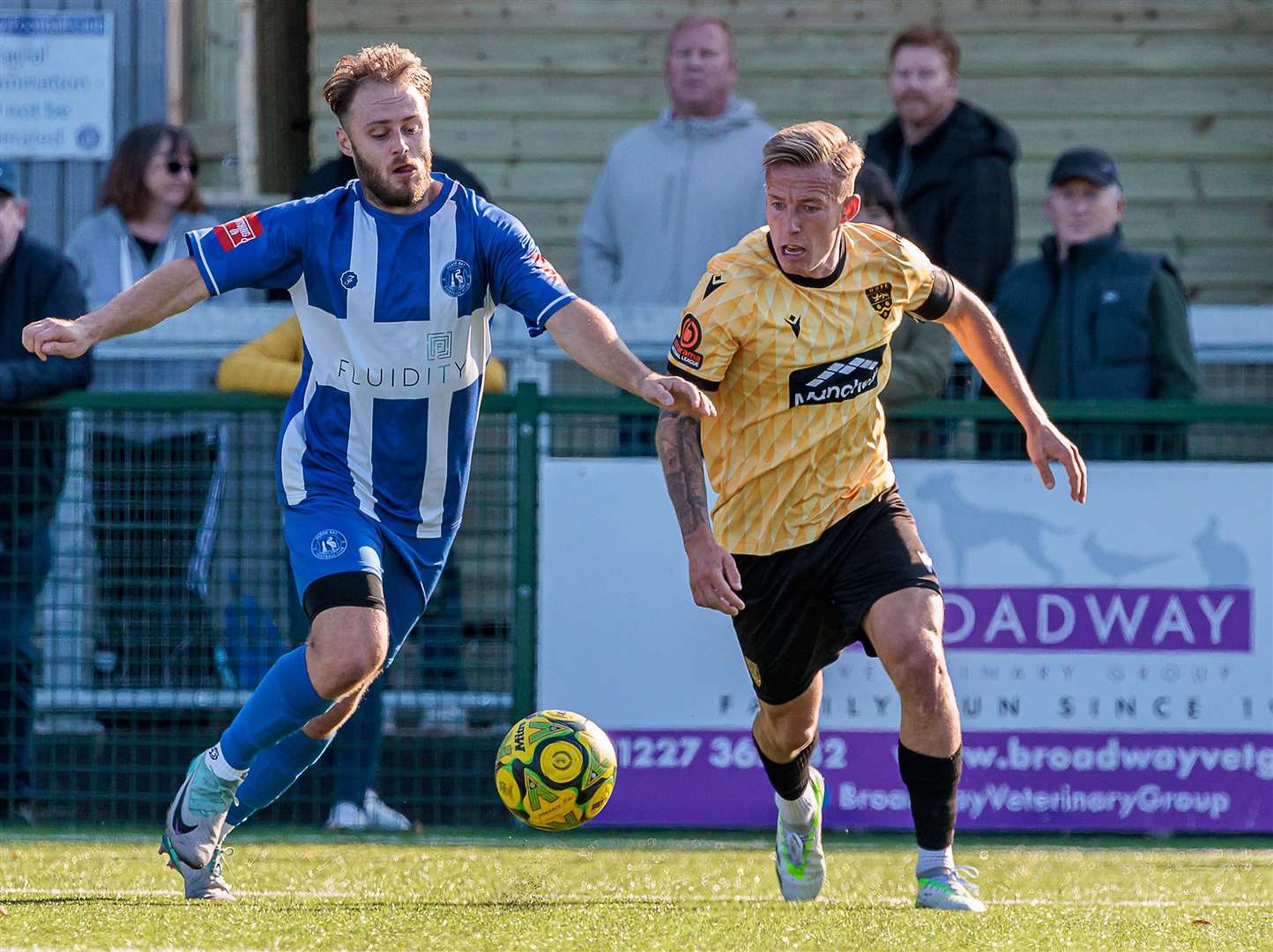 Herne Bay's Jack Parter up against Maidstone skipper Sam Corne. Picture: Helen Cooper