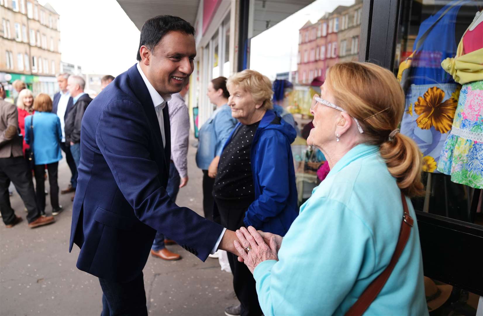 Scottish Labour leader Anas Sarwar meeting locals on a walkabout in Clarkston, East Renfrewshire (Andrew Milligan/PA)