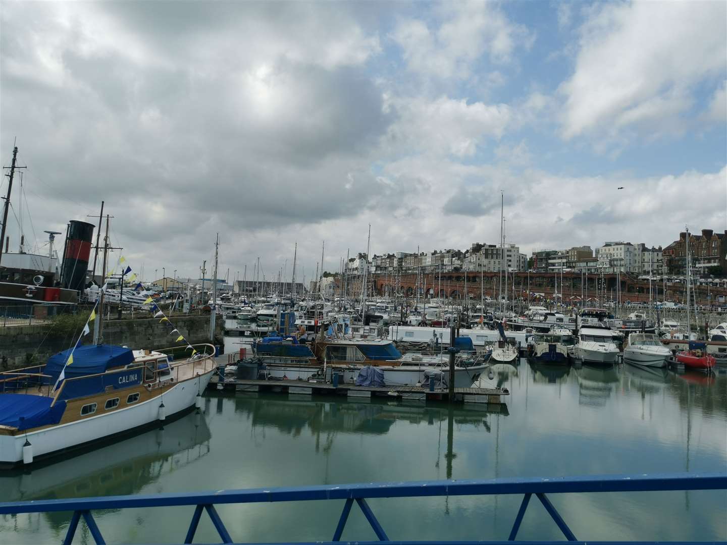 Police at the scene after Mr Pacan's body was recovered from the harbour