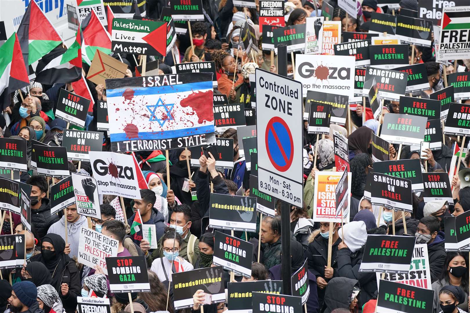 Banners and placards caused for peace in Gaza (Yui Mok/PA)