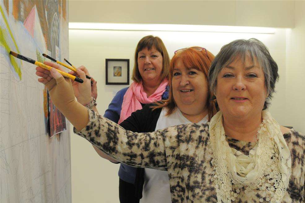 Joining in with the painting are Janet Webb, Sharon Roberts and Clare Ayres