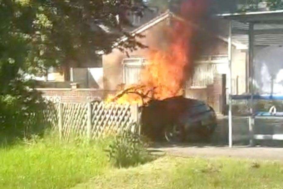 The two-seater car began to smoke whilst the owner was driving it