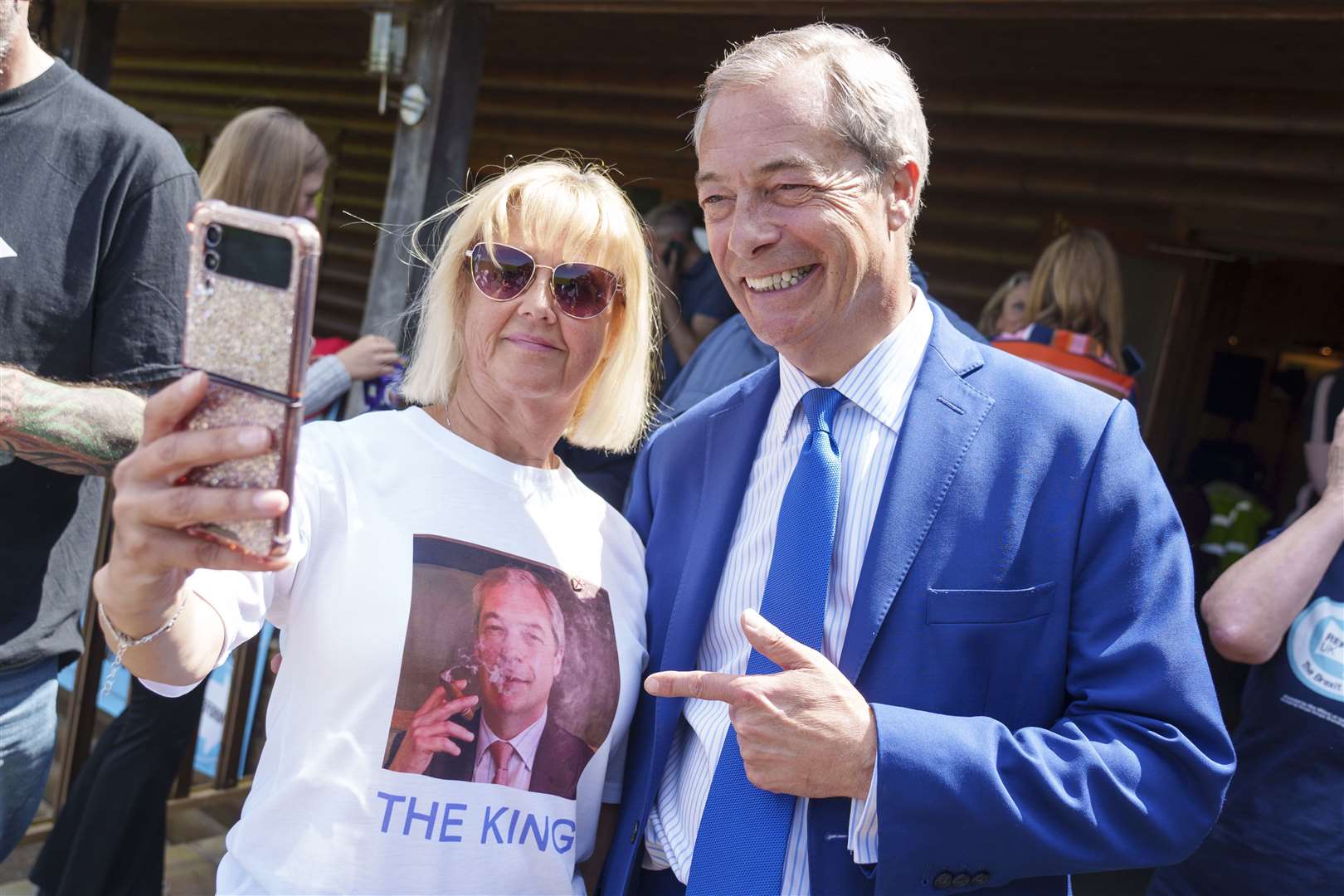 Fans flocked to Mr Farage for selfies during his campaign visits (Dominic Lipinski/PA)