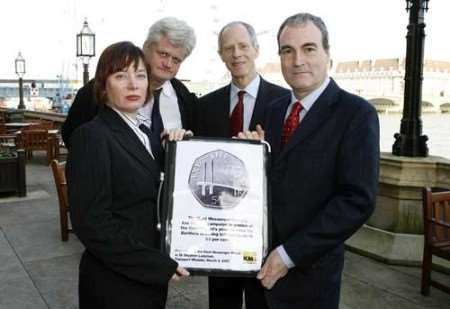 PROTEST: (left to right) Sandra Hembury, Sam Lennon and Dr Howard Stoate hand over the Kent Messenger Group's online petition to Transport Minister Dr Steve Ladyman. Picture: JAMIE GRAY