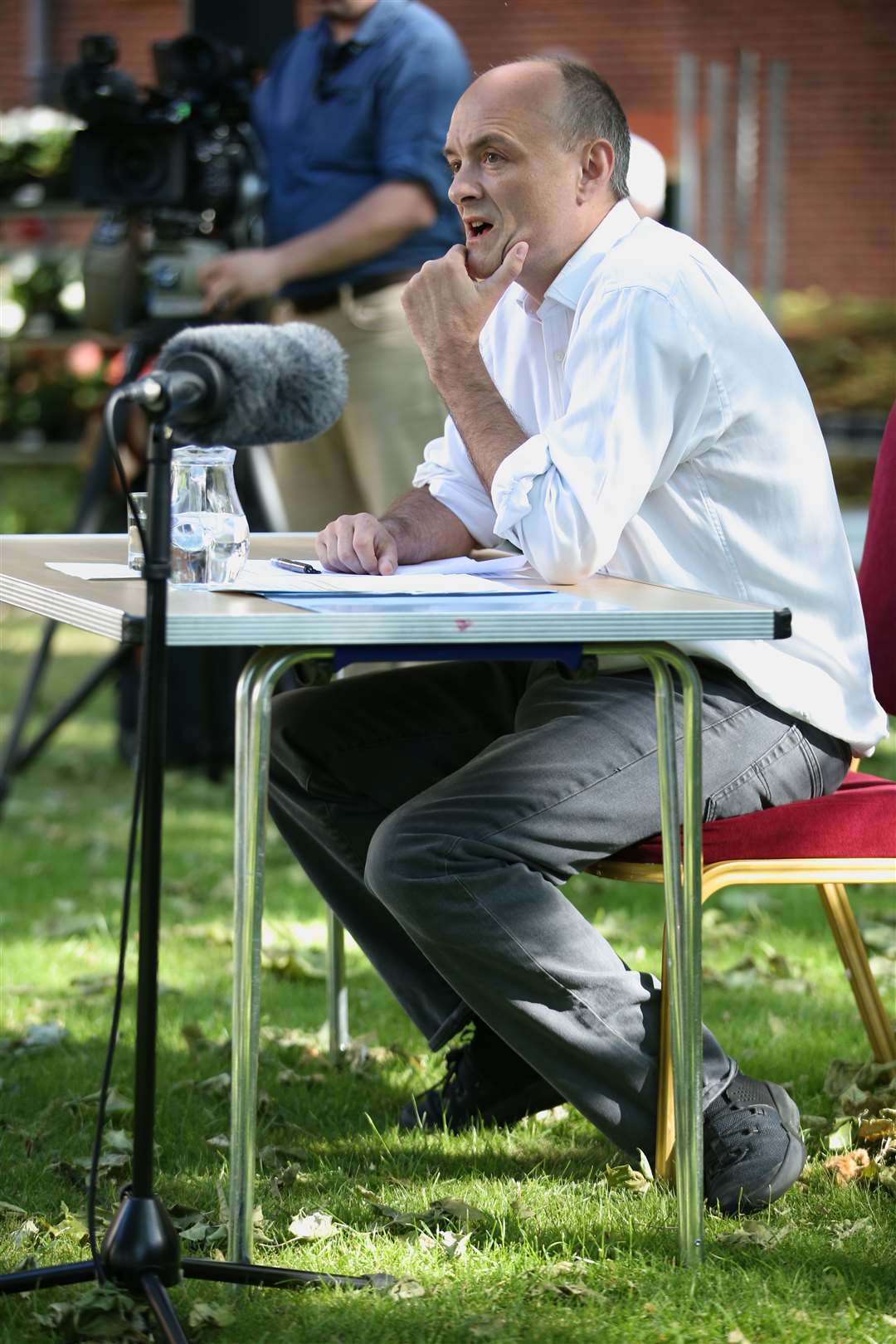 Mr Cummings answers questions from the media (Jonathan Brady/PA)