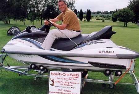 Paul Sherman with the jetski he won for a hole in one