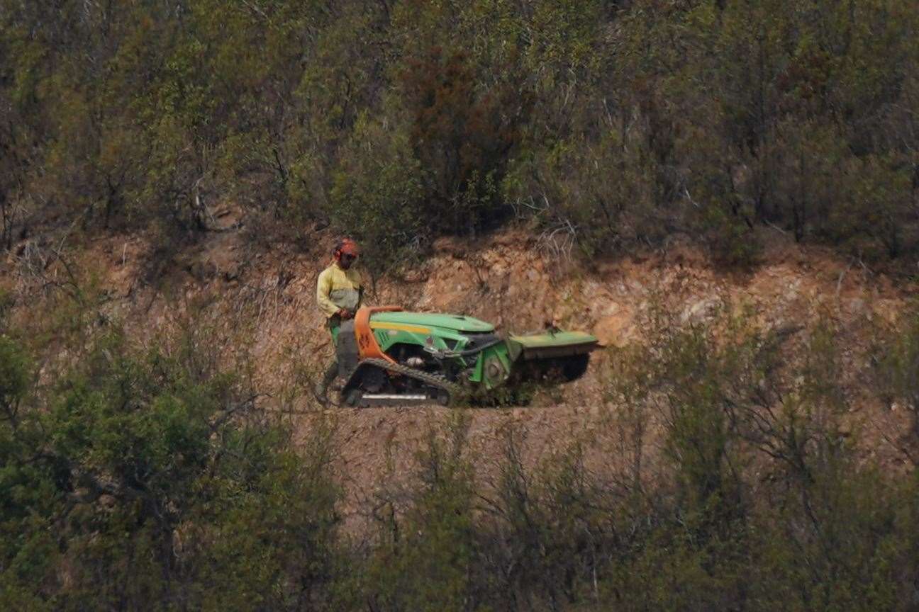 Search teams were working in areas of scrub and woodland near the reservoir on Wednesday (Yui Mok/PA)