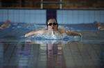 A young swimmer cleaves through the water - picture Barry Goodwin