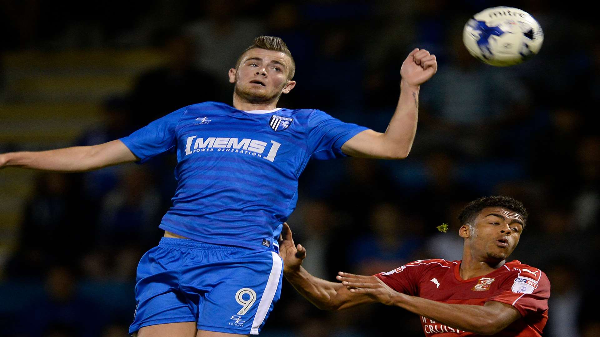 Rory Donnelly climbs highest against Swindon. Picture: Ady Kerry