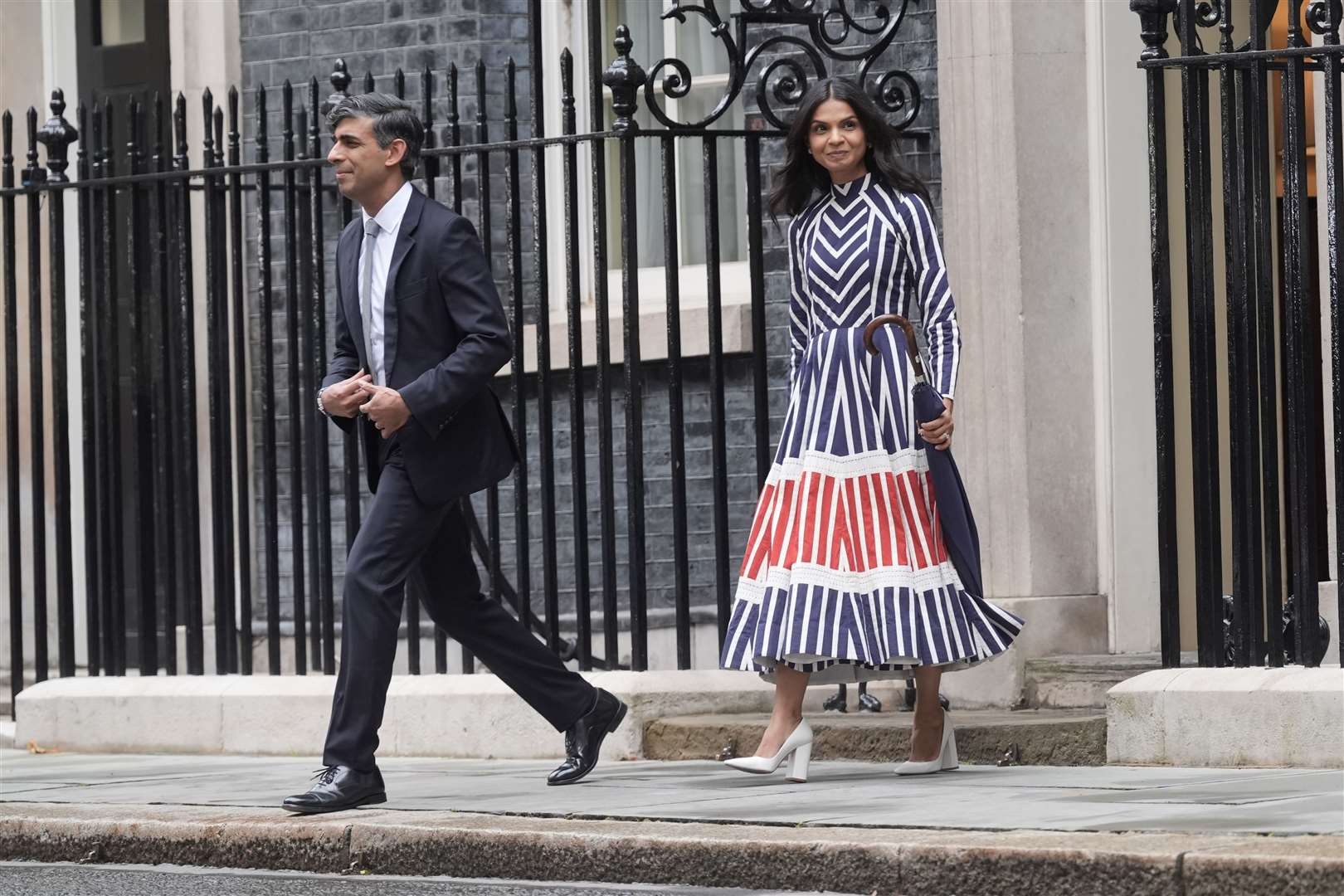 Rishi Sunak in Downing Street with his wife Akshata Murty (Stefan Rousseau/PA)